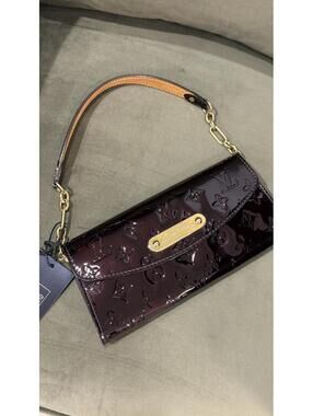 LOUIS VUITTON - Sunset Boulevard Clutch, Amarante Vernis Leather